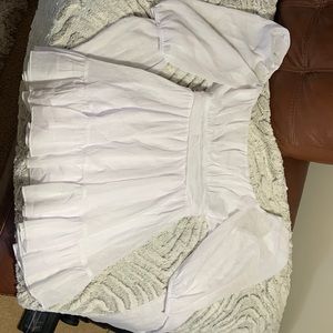 Lucy in the sky, short white long sleeve dress.